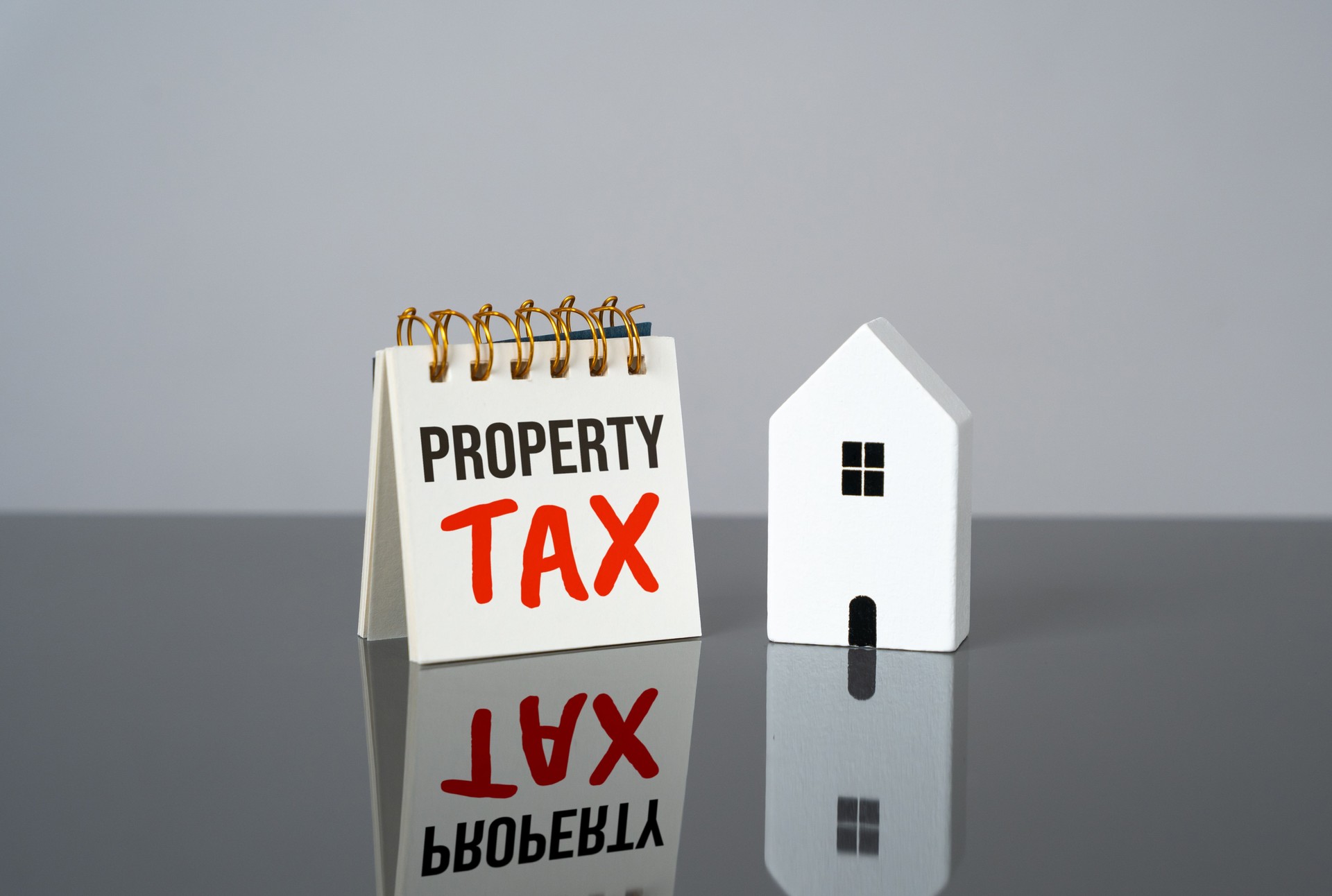 Property tax and house figure. Balancing property value and taxation. Deadlines and terms. Tax write-off.